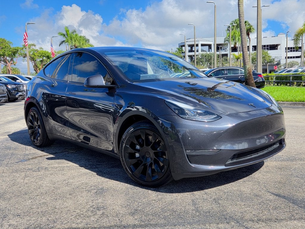 Used 2024 Tesla Model Y Long Range with VIN 7SAYGDEE5RA279924 for sale in Tamarac, FL
